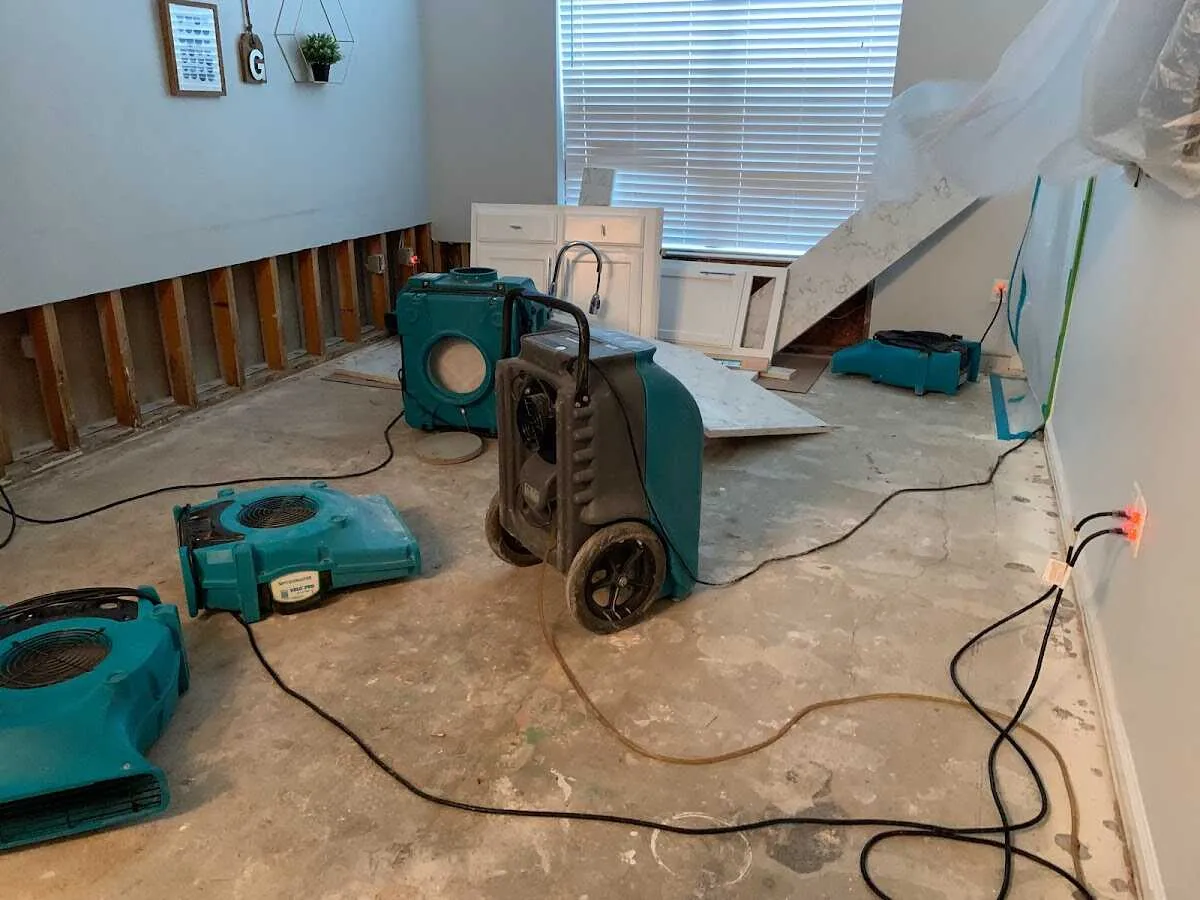 Dehumidifier in flood-cut room for Water Damage Restoration in Cumberland